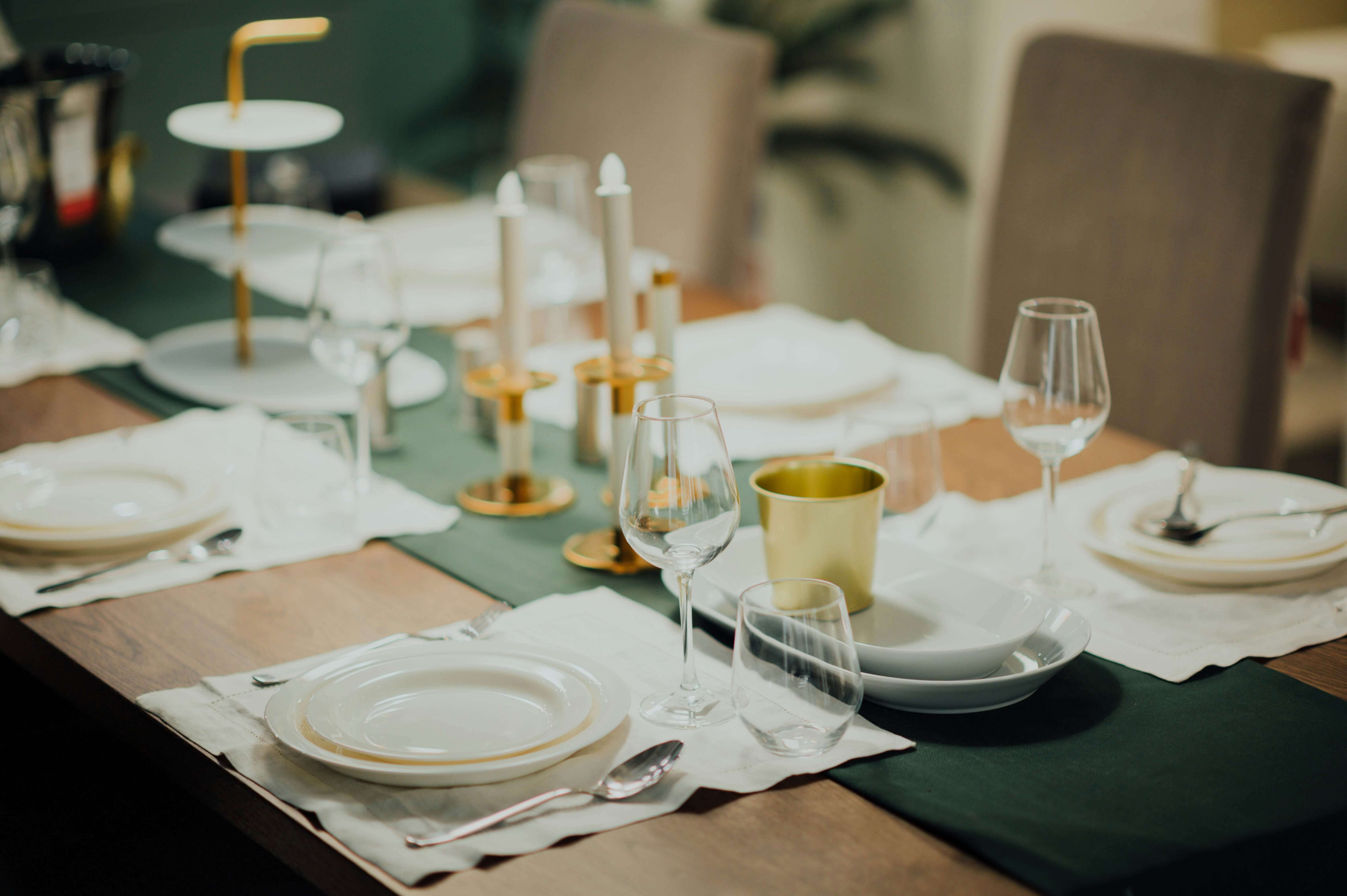 a dining table and plates at a luxury restaurant