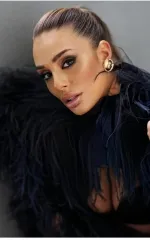 Rochelle wearing a feathery scarf