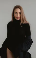 Alessandra in a black blouse