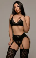 Ste standing in black lingerie looking at you invitingly 