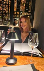 Gemma waiting for her favourite meal to arrive at a lavish restaurant 
