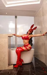 Jade dressed as a naughty bunnygirl in the bathroom