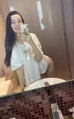 Roxana taking a mirror selfie 