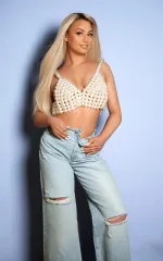 Ada standing in mom jeans 
